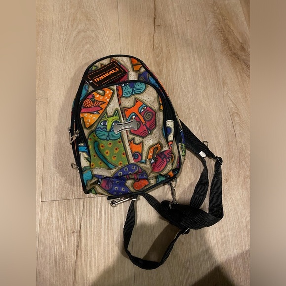 other Handbags - NWT Findings Abstract Cat Printed Artist Sling to Backpack